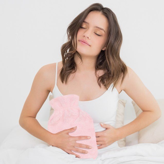 Bouillotte 2L en fausse fourrure rose poudré