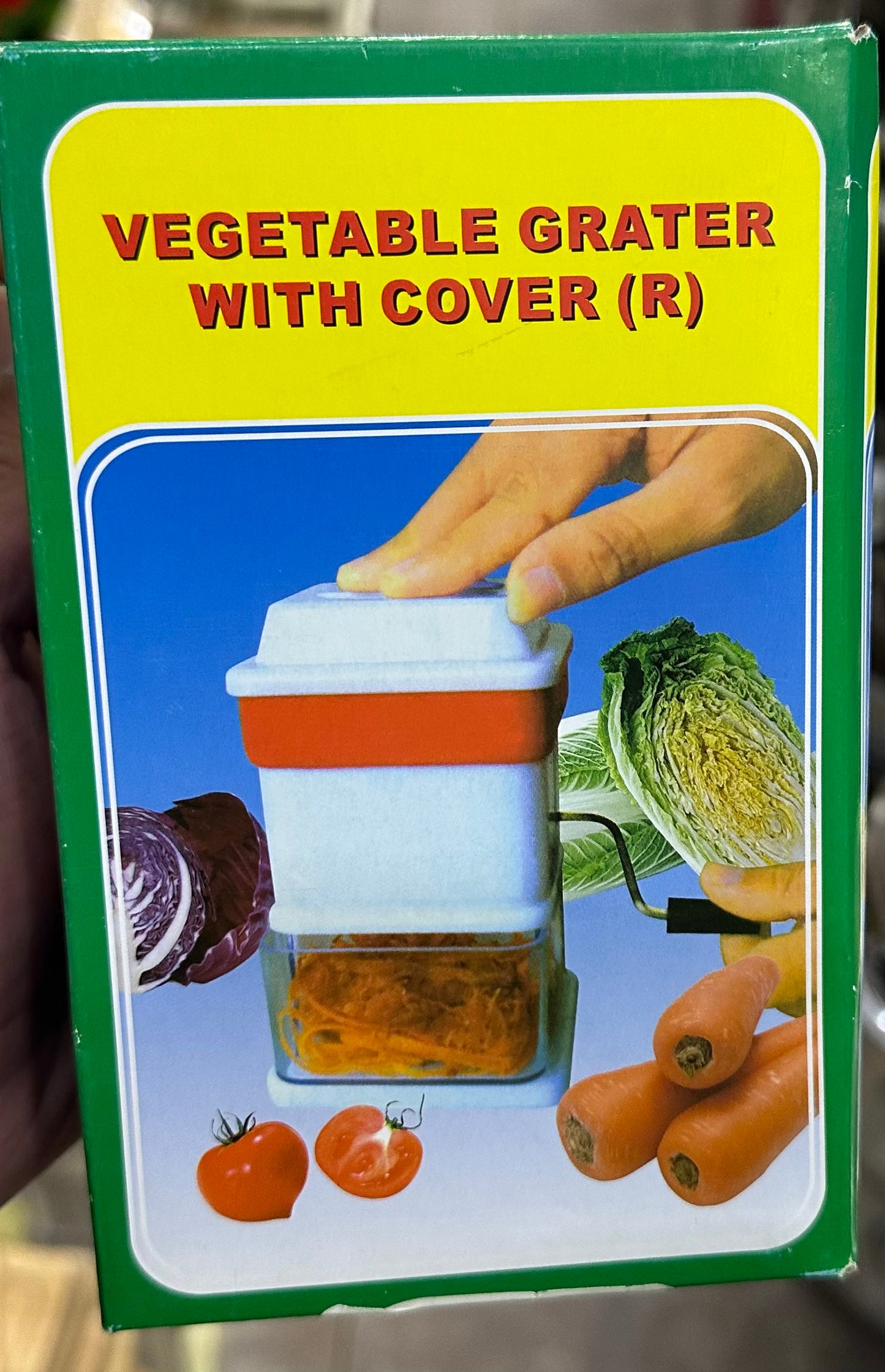 Râpe à légumes avec couvercle