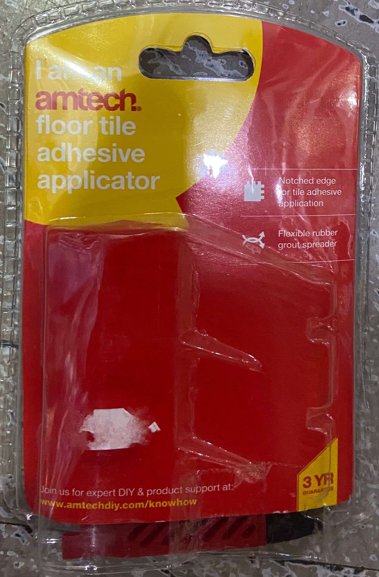 Applicateur de colle à carrelage