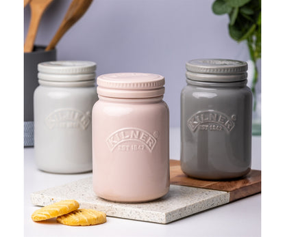 Sublimez votre cuisine : Pot en céramique avec couvercle à poussoir rose poudré 0,6 litre | Solution de rangement élégante.
