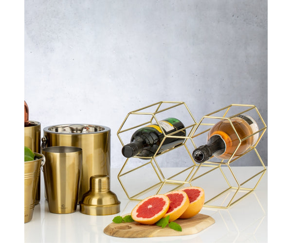 Sublimez votre bar à la maison avec notre élégant porte-bouteilles doré.