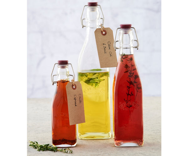 1 Litre Clip Top Square Bottle: Durable Glassware for Storage.