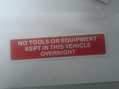 NO TOOLS OR EQUIPMENT ARE STORED IN THIS VEHICLE OVERNIGHT STICKER