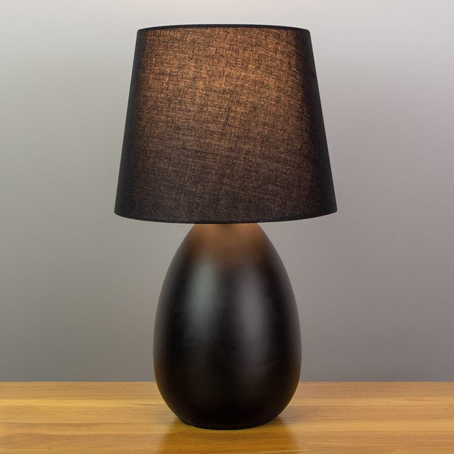 Lampe de table ovale en métal noir avec base