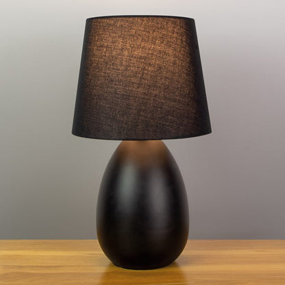 Lampe de table ovale en métal noir avec base