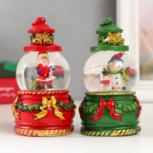 BOULE À NEIGE MAGIE DE NOËL PÈRE NOËL SUR SON TRAÎNEAU 65 mm coloris assortis