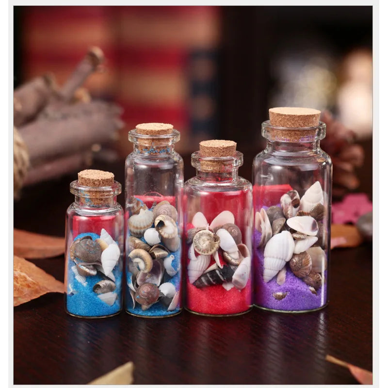 15Cm Glass Round Bottle With Sand & Shells  Assorted